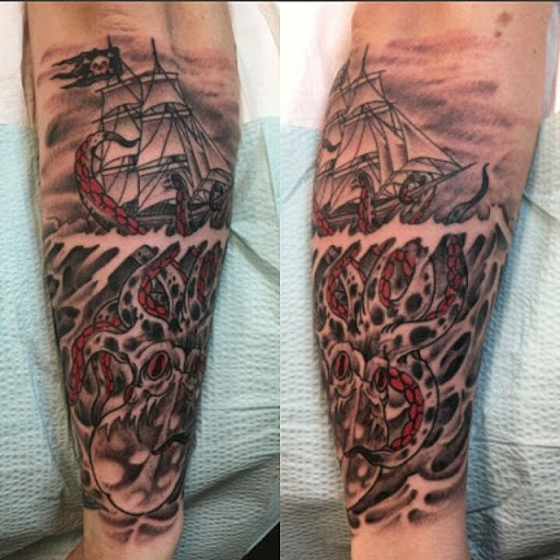 Capitol City Tattoo and Piercing Tattoo Specialist at 4320 Martin Way