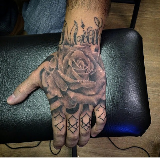 Rock'N Willy's Tattoo & Piercing Tattoo Specialist at 700 Milford Rd